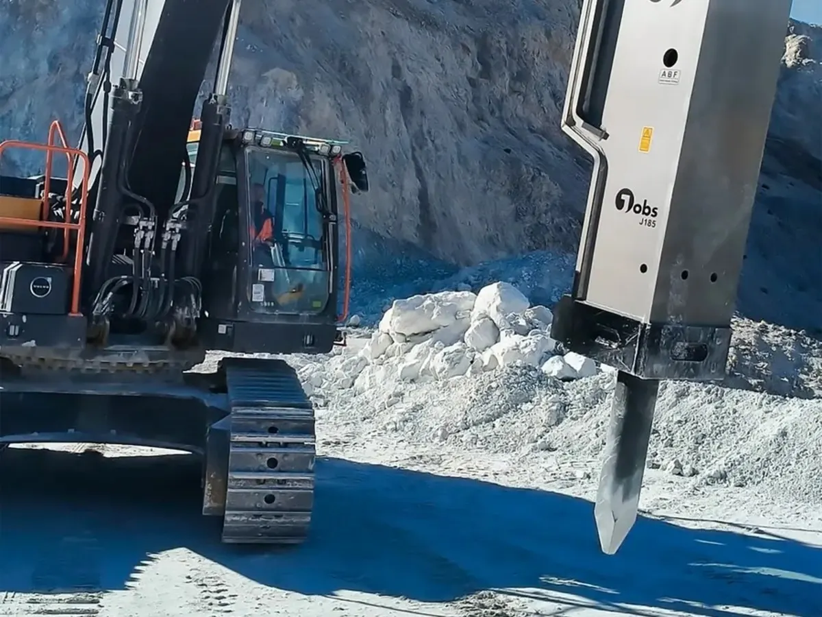 Large JOBS hydraulic breaker from BYG working a quarry face