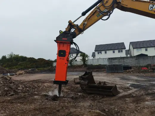NPK rock breaker breaking ground on a new housing development