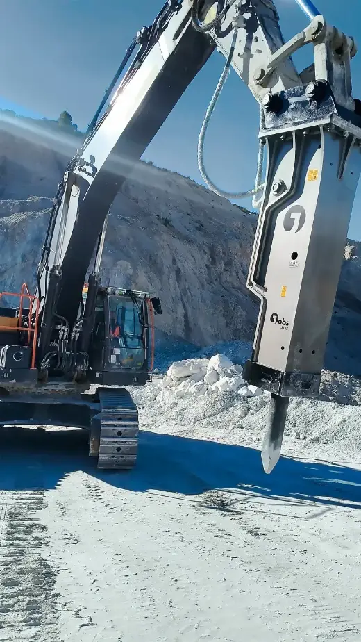 Hydraulic breaker working a quarry face