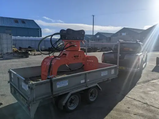 Attachment loaded on a tipper body for delivery