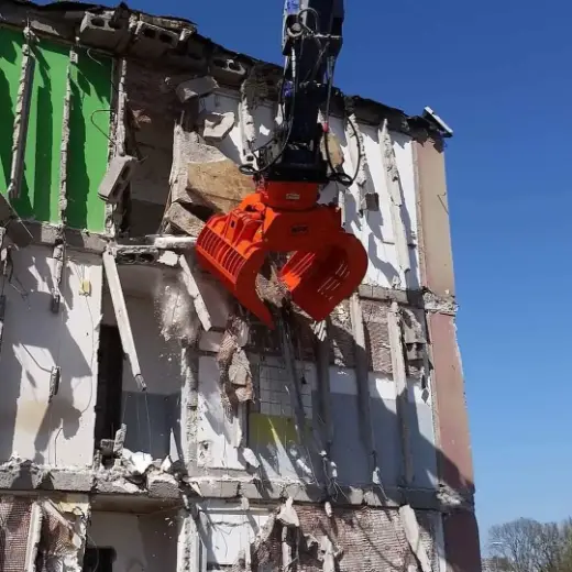 Demolition attachment working inside a building strip-out
