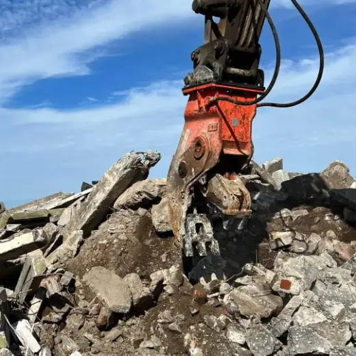 Attachment sorting broken concrete on site