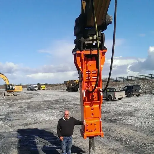 Hydraulic post driver working on a fencing job