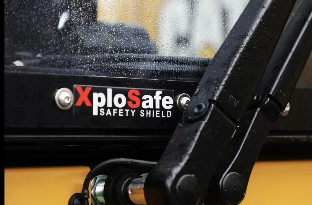 XploSafe Safety Shield fitted to a CAT excavator cab